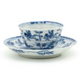 A Blue and White Cup and Saucer