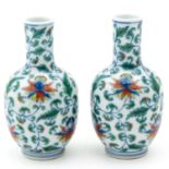 A Pair of Polychrome Small Vases