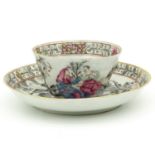 A Famille Rose Cup and Saucer