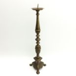 A Bronze Church Candlestick