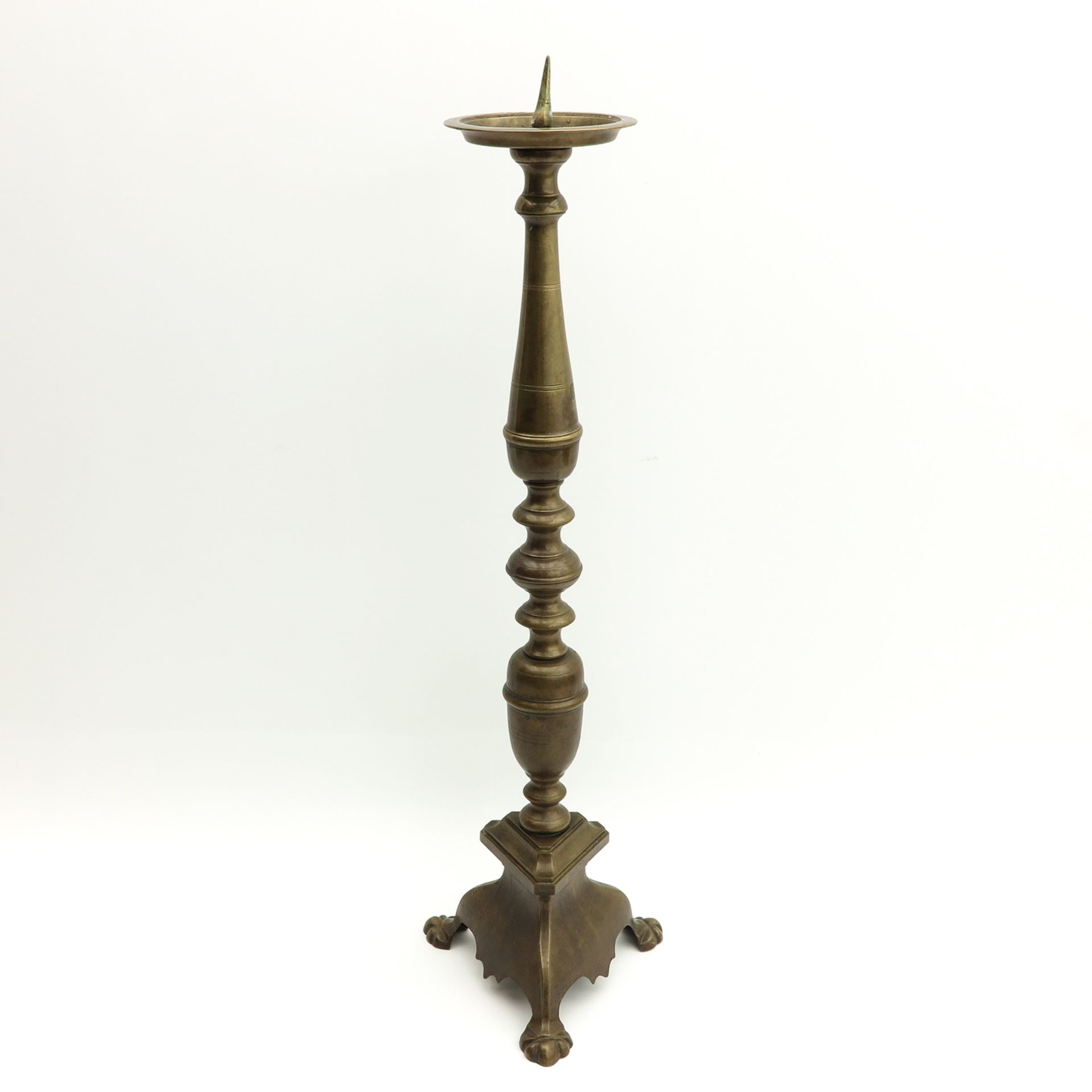 A Bronze Church Candlestick