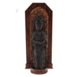 A Quanyin Sculpture on Wood Frame