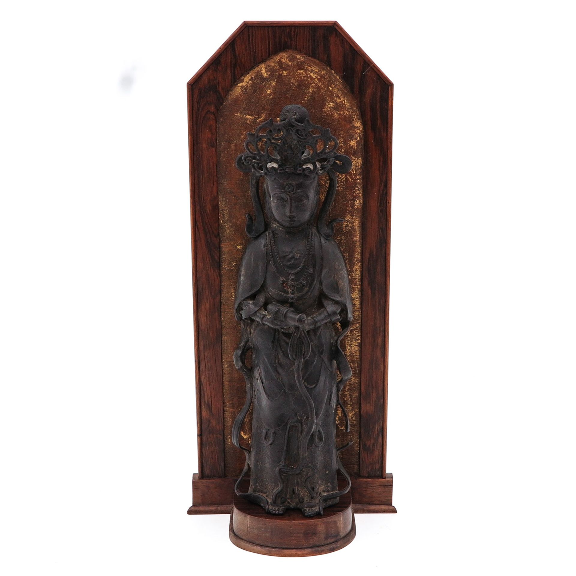 A Quanyin Sculpture on Wood Frame