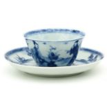 A Blue and White Cup and Saucer