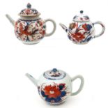 A Collection of Three Teapots