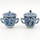 2 Blue and White Covered Cups