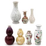 A Collection of 7 Vases