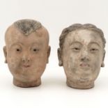 Two Chinese Clay Temple Heads
