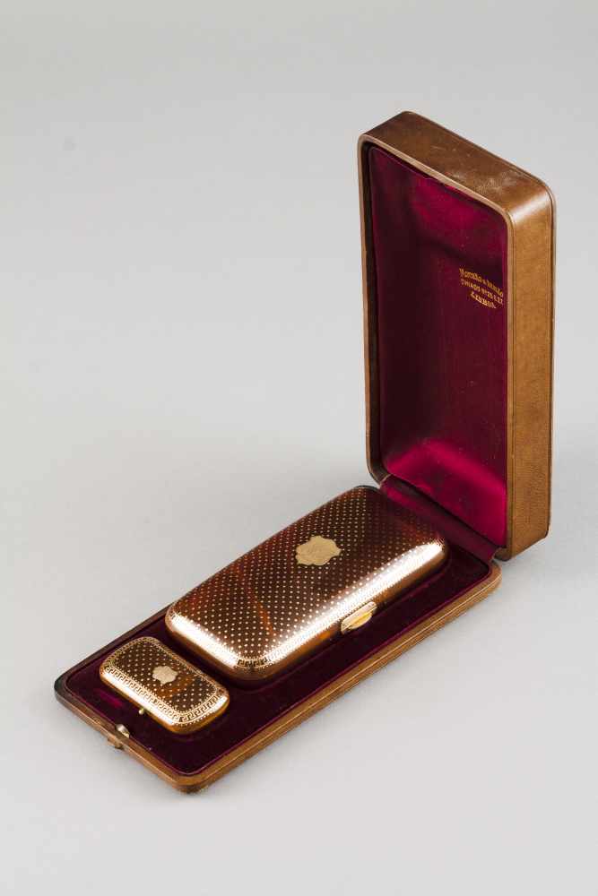 A cigar box and vesta case