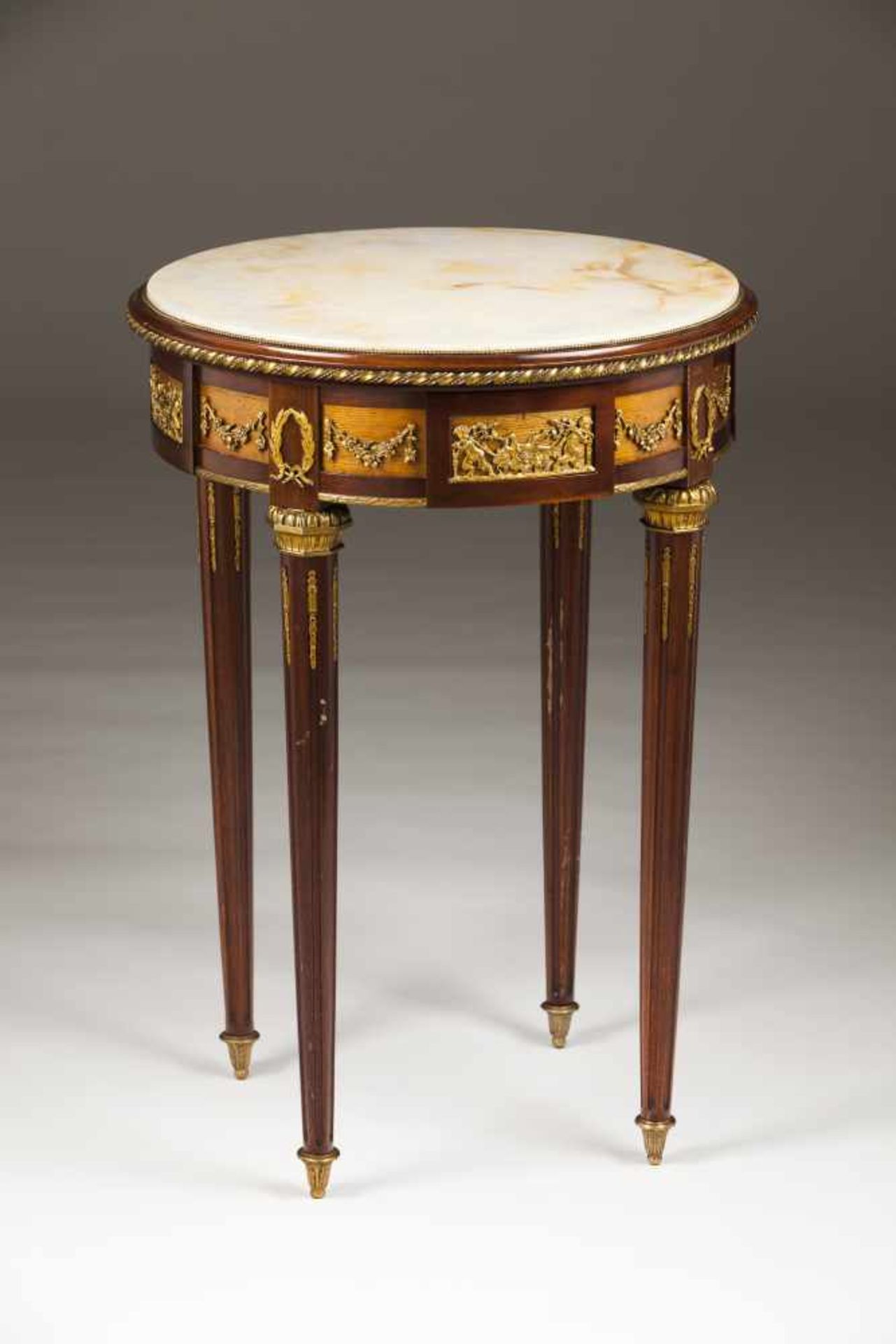 A Louis XVI style occasional table