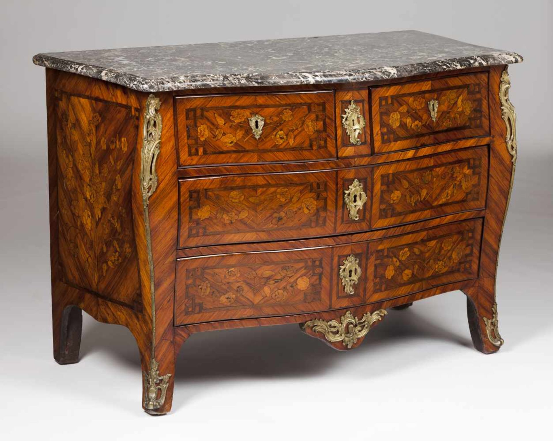 An important French commode stamped Jacques BirckléRosewood, violet wood and other timbersF