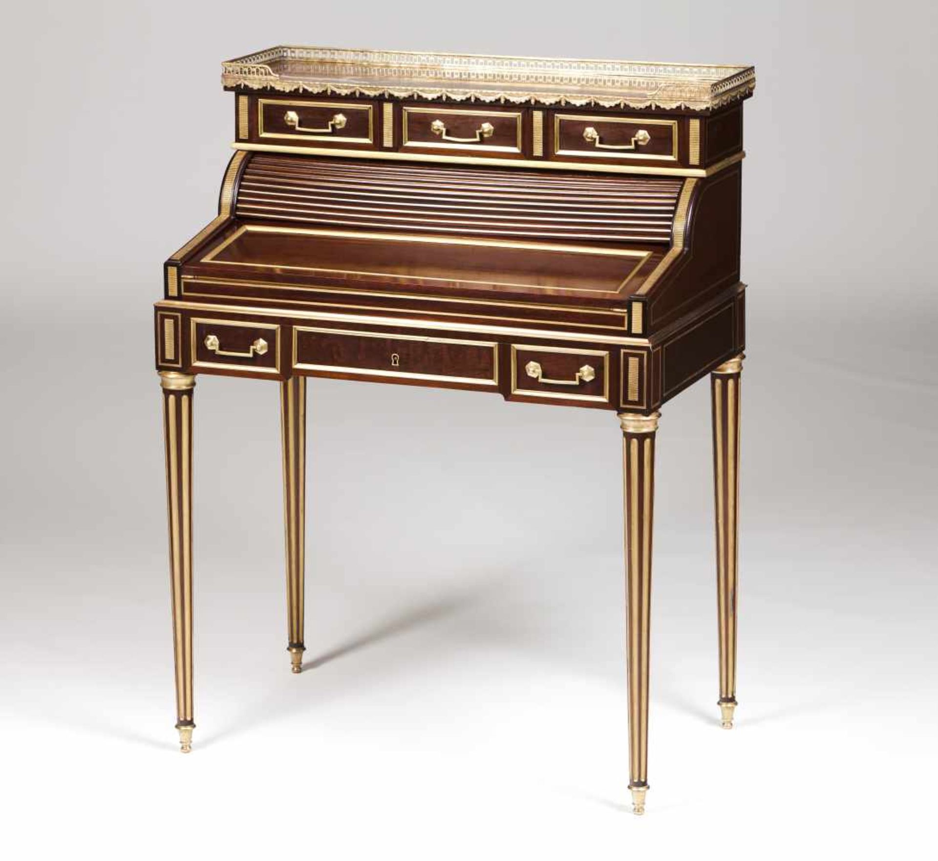 A small Louis XV roll top deskSolid and veneered mahoganyGilt metal mounted decorationM