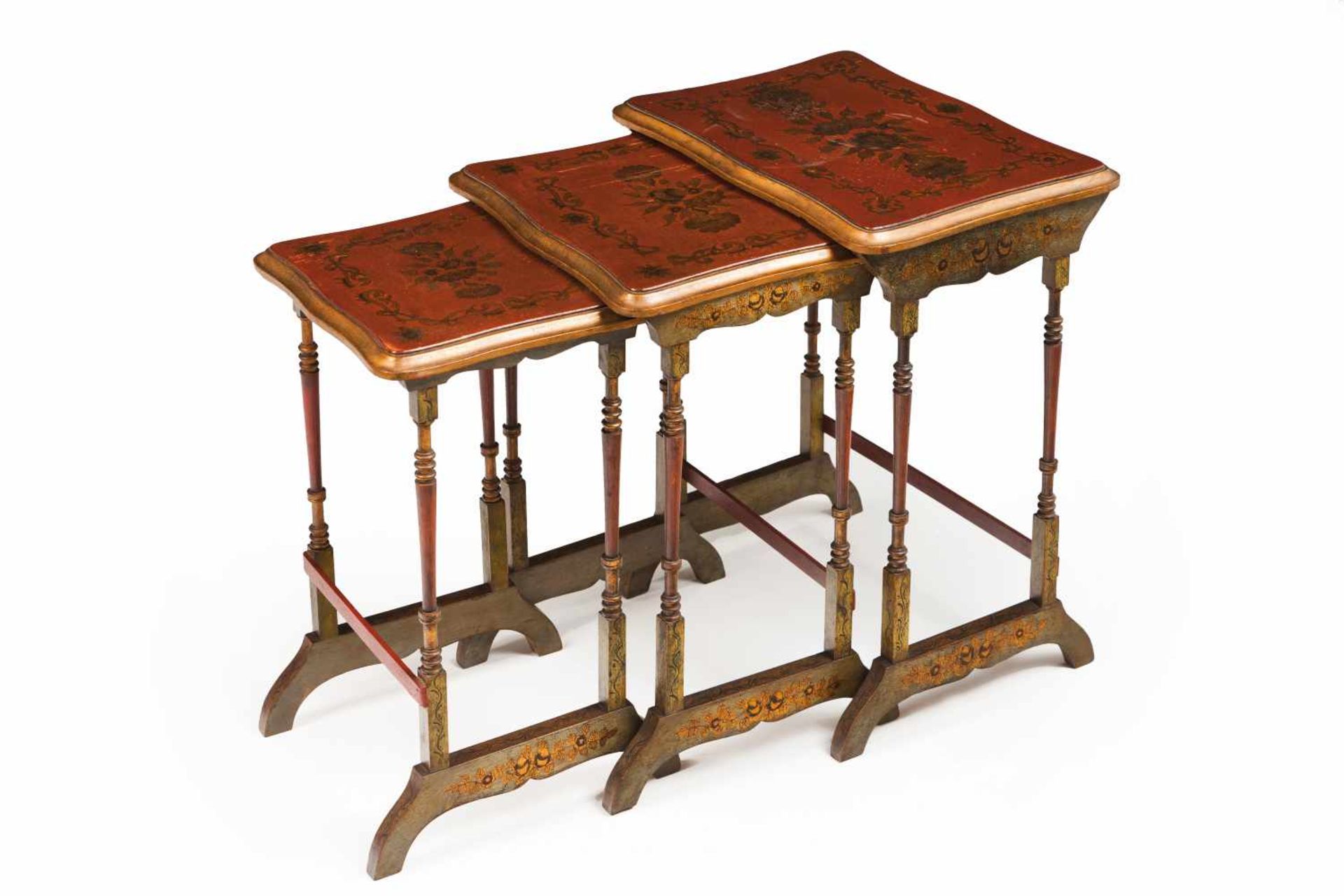 A three side tables setRed and green lacquered wood of gilt foliage motif decorationEngland