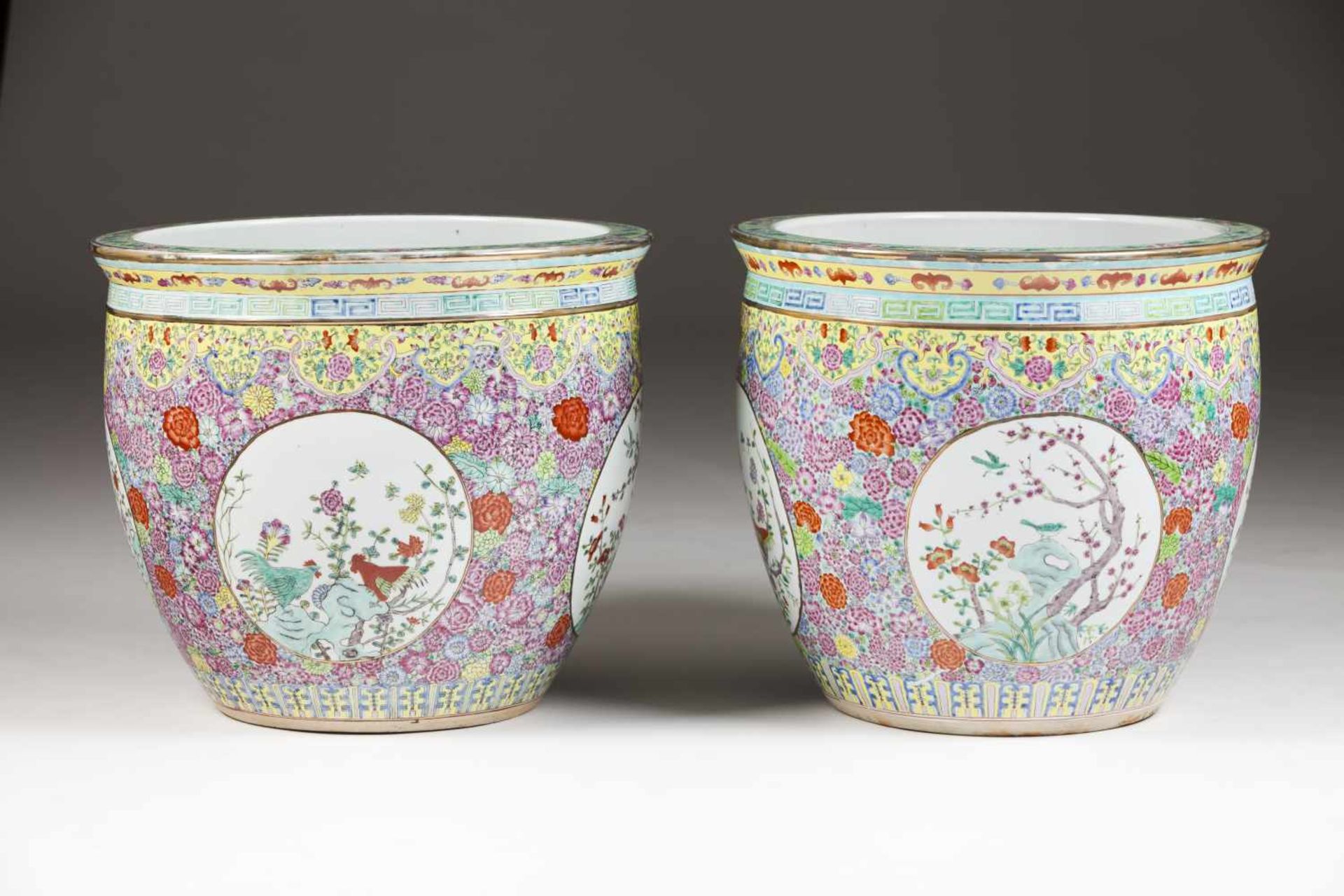 A pair of large fish bowlsChinese porcelainPolychrome and gilt decoration with landscape, g