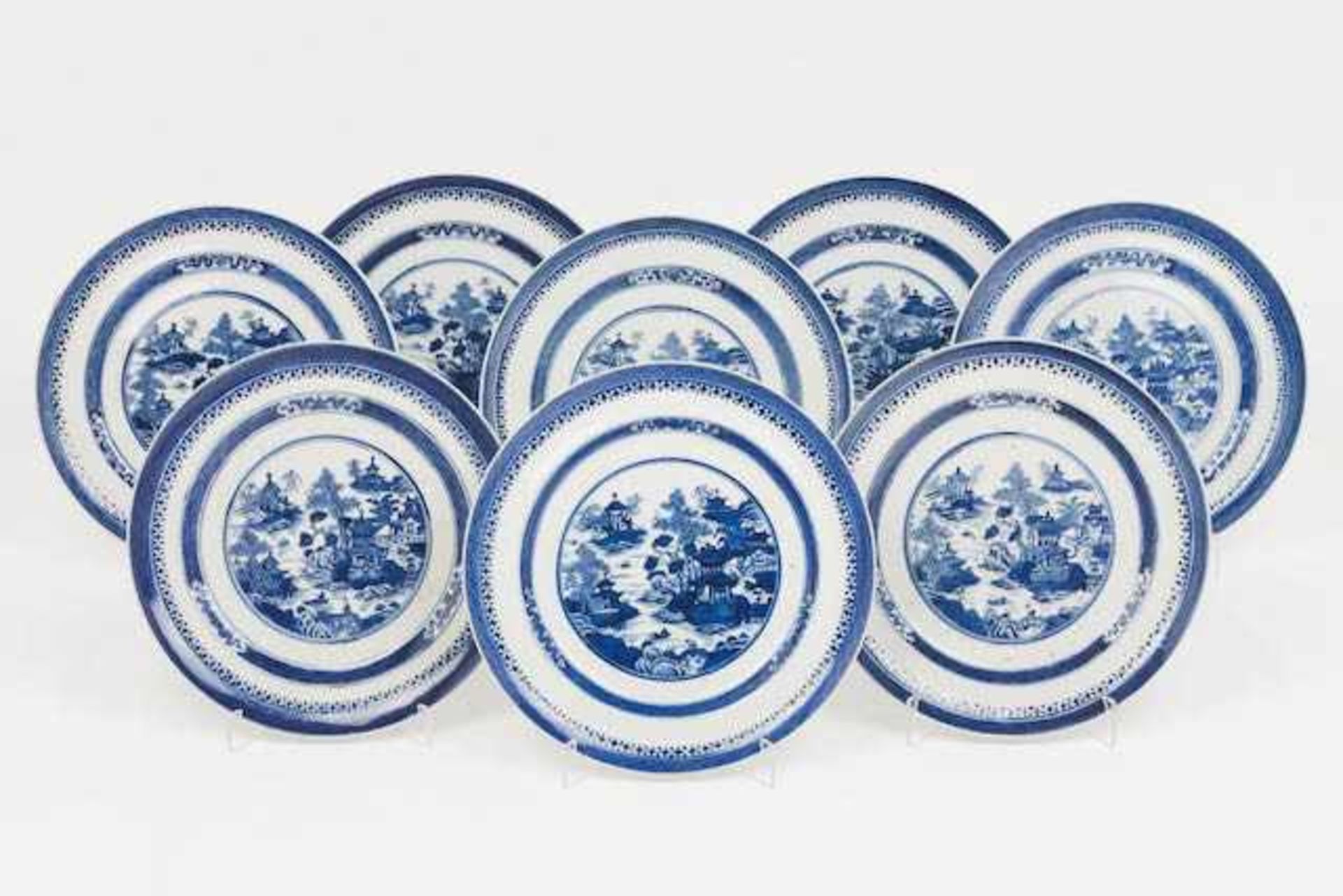 A set of eight platesChinese porcelainBlue underglaze decoration of river views and pagodas