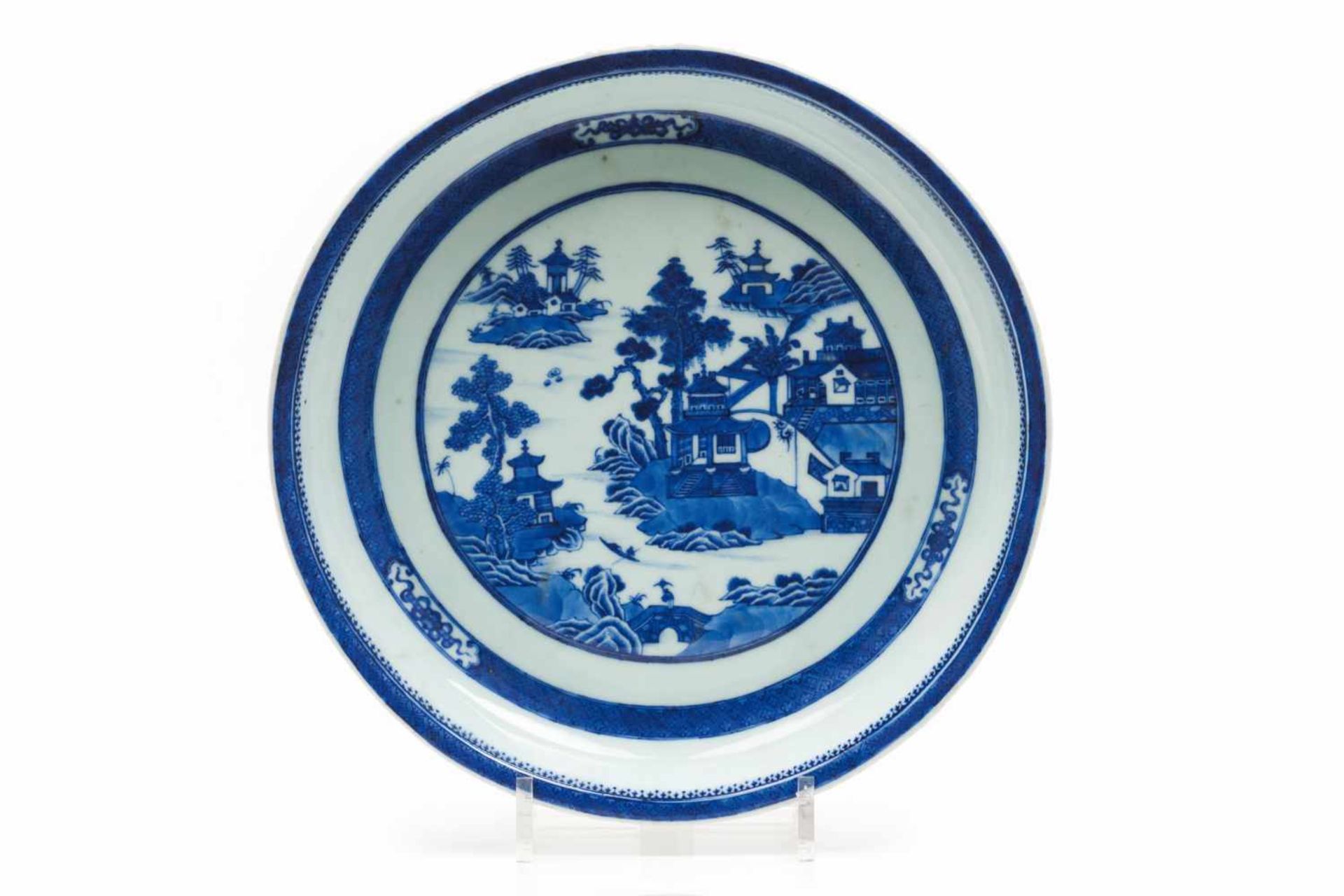 A large plateChinese porcelainBlue underglaze decoration of river view with pagodasDaog