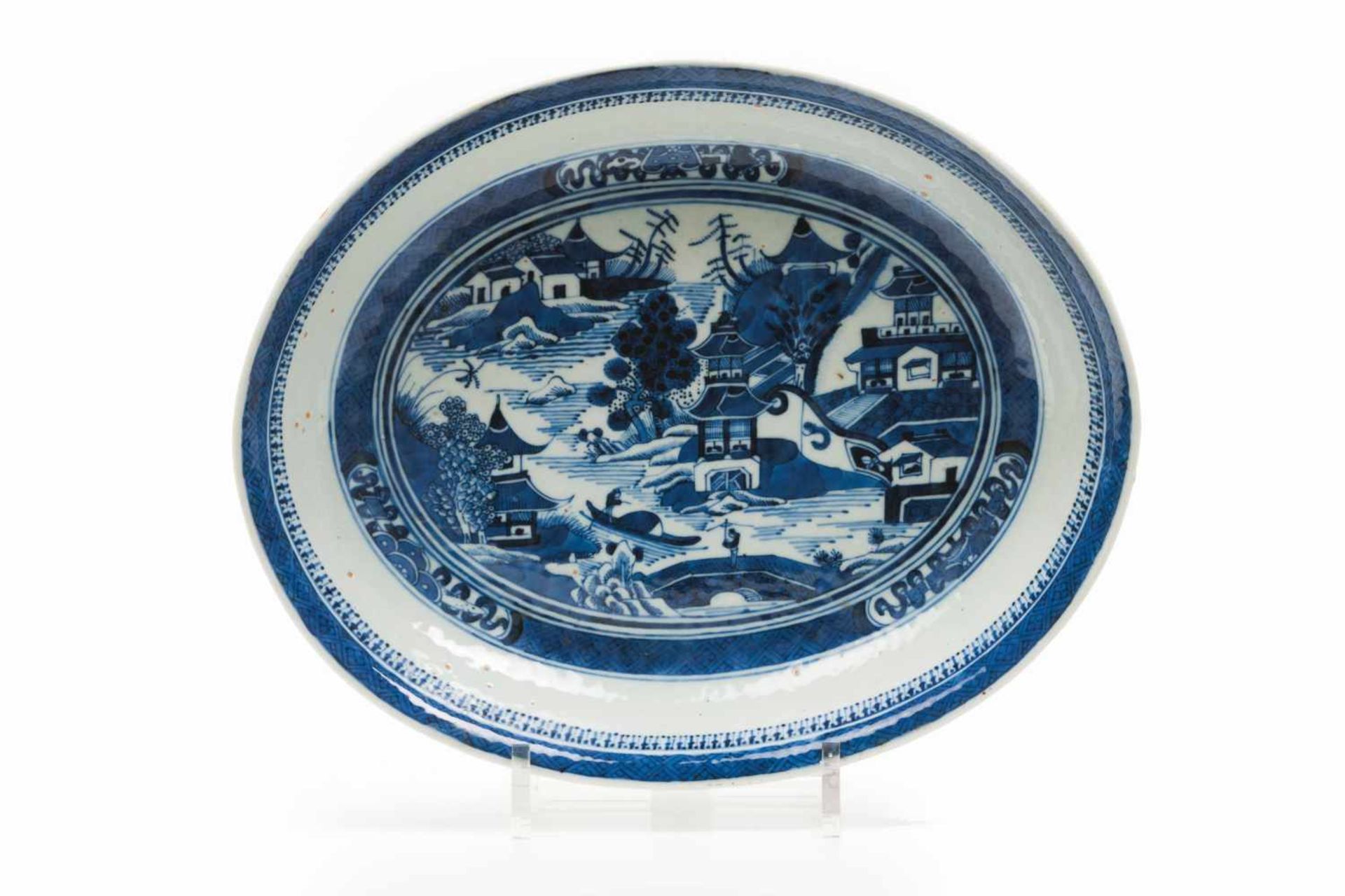 A serving trayChinese porcelainBlue underglaze decoration of river view with pagodasDao