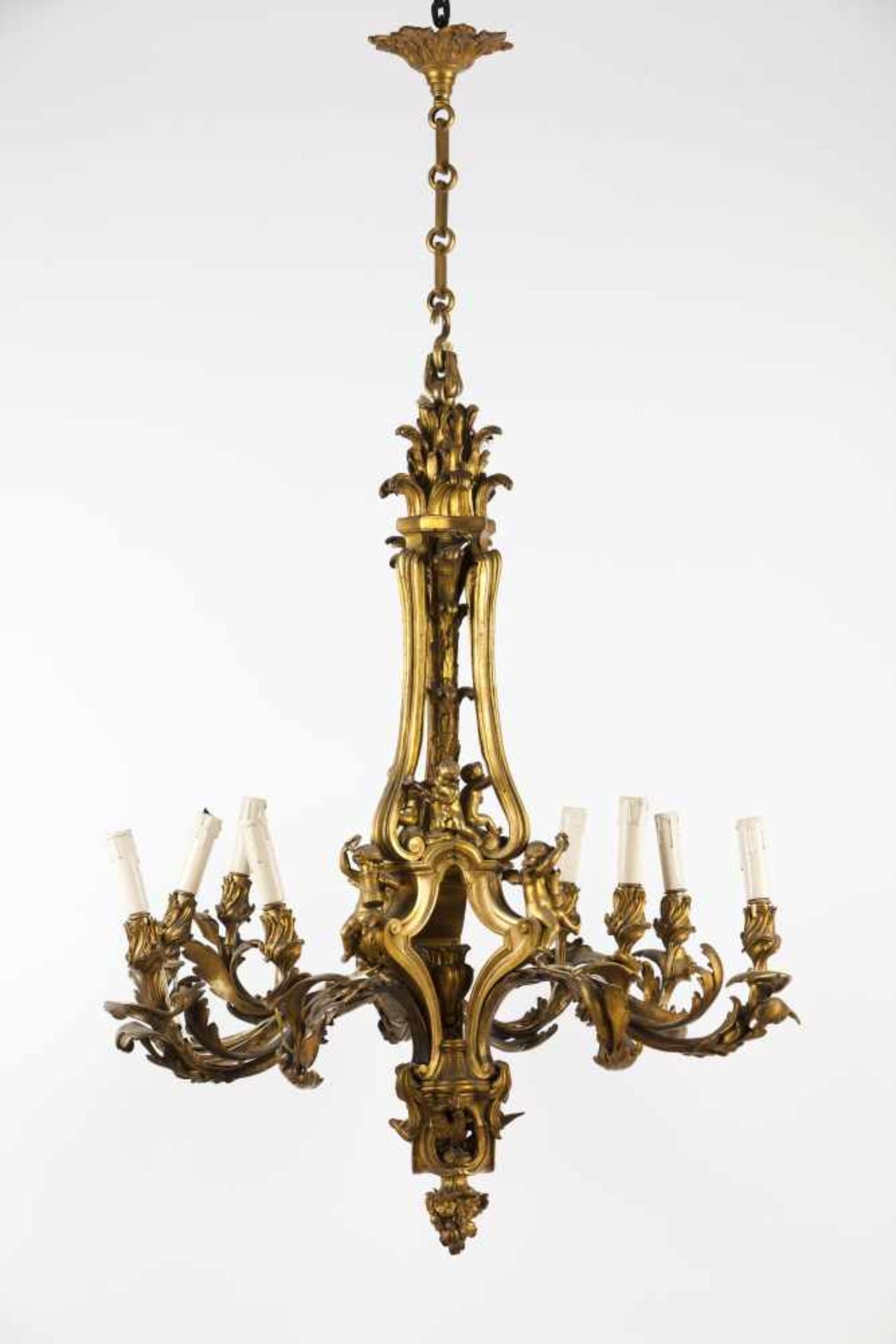 A large Louis XV style chandelier of Jacques Caffieri styleRaised, chiselled and gilt bronze<br