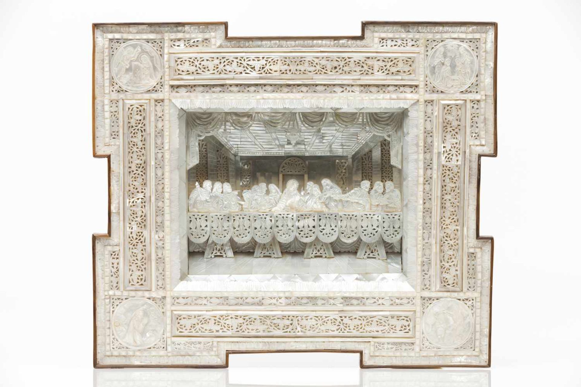 A cased Last Supper sceneMother-of-pearl veneered walnut and frame of mother-of-pearl plaques d