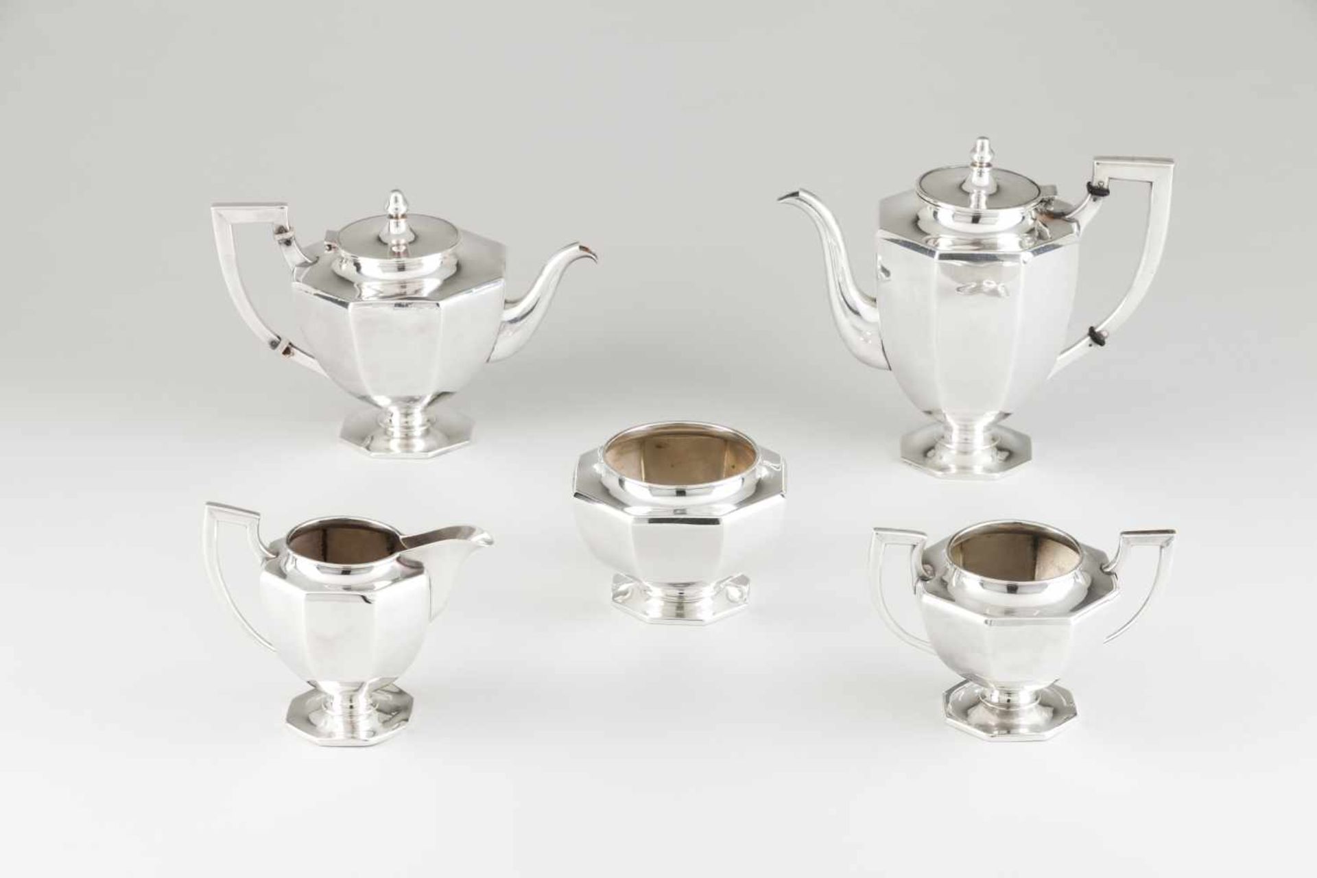 Tea and coffee setChinese silverFaceted body and base with straight handles and turned cove