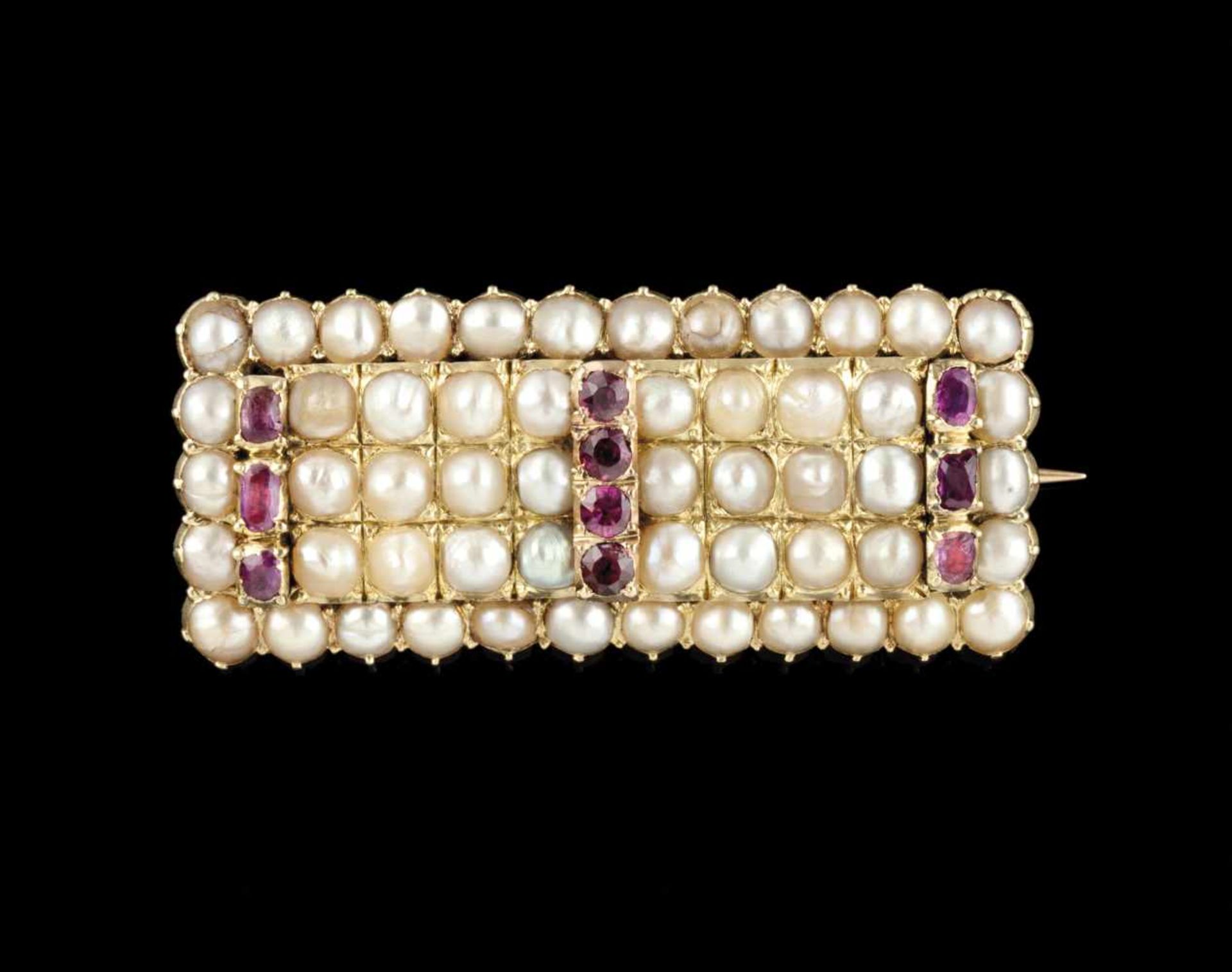 A broochGoldSet with half pearls, small tourmalines and rubiesEurope, circa 1940Unm