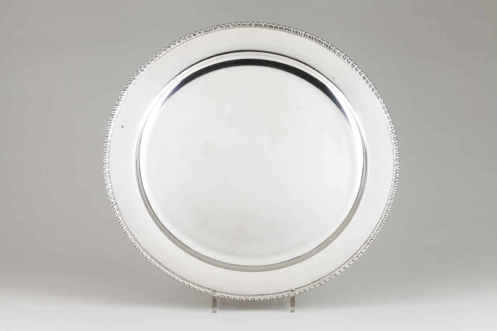 A serving dishPortuguese silverPlain base of gadrooned friezeLisbon hallmark, Eagle 835