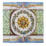 A tile panel36 tilesA part of frieze with central medallion with floral decoration in green, yellow,
