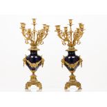 A pair of seven branch candelabraGilt bronze and blue porcelainGarland and floral and foliage motifs