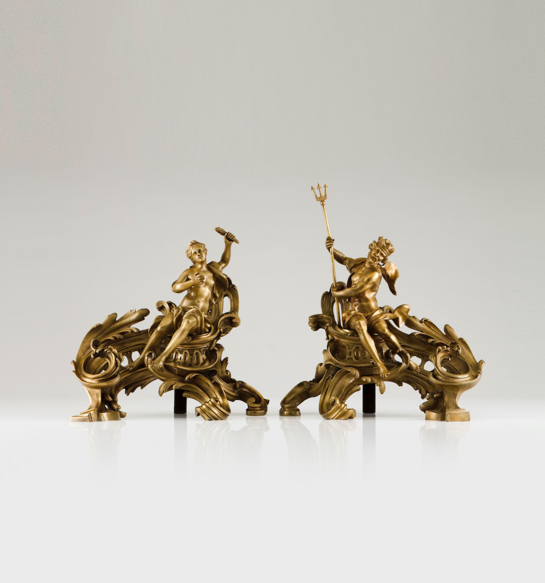 Henri Vian (1860-1905)A pair of firedogsRaised, chiselled and gilt bronze depicting Poseidon and