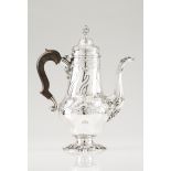 An important D.José coffee potPortuguese silver, 18th centuryPear shaped body of rocaille raised,