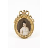 Madame de VilleneuvePortrait of a ladyMiniature on ivoryGilt bronze frame toped by bow13x9,5 cm (