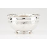 A drip bowlPortuguese silver, 19th centuryPlain turned body of engraved foliage band and gadrooned