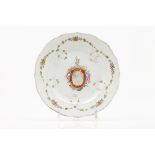 An armorial plateScalloped lipChinese export porcelainPolychrome decoration with central armorial