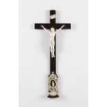 A crucified ChristIvory sculptureRosewood cross with ivory holy water basinCarved and pierced