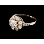 A ringGoldCentral flower set with one antique brilliant cut diamond (ca.0.50ct) and 8 totalling (