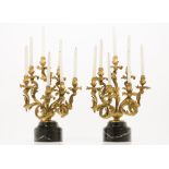 A pair of Louis XV seven branch candelabraGilt and chiselled bronze if floral and foliage