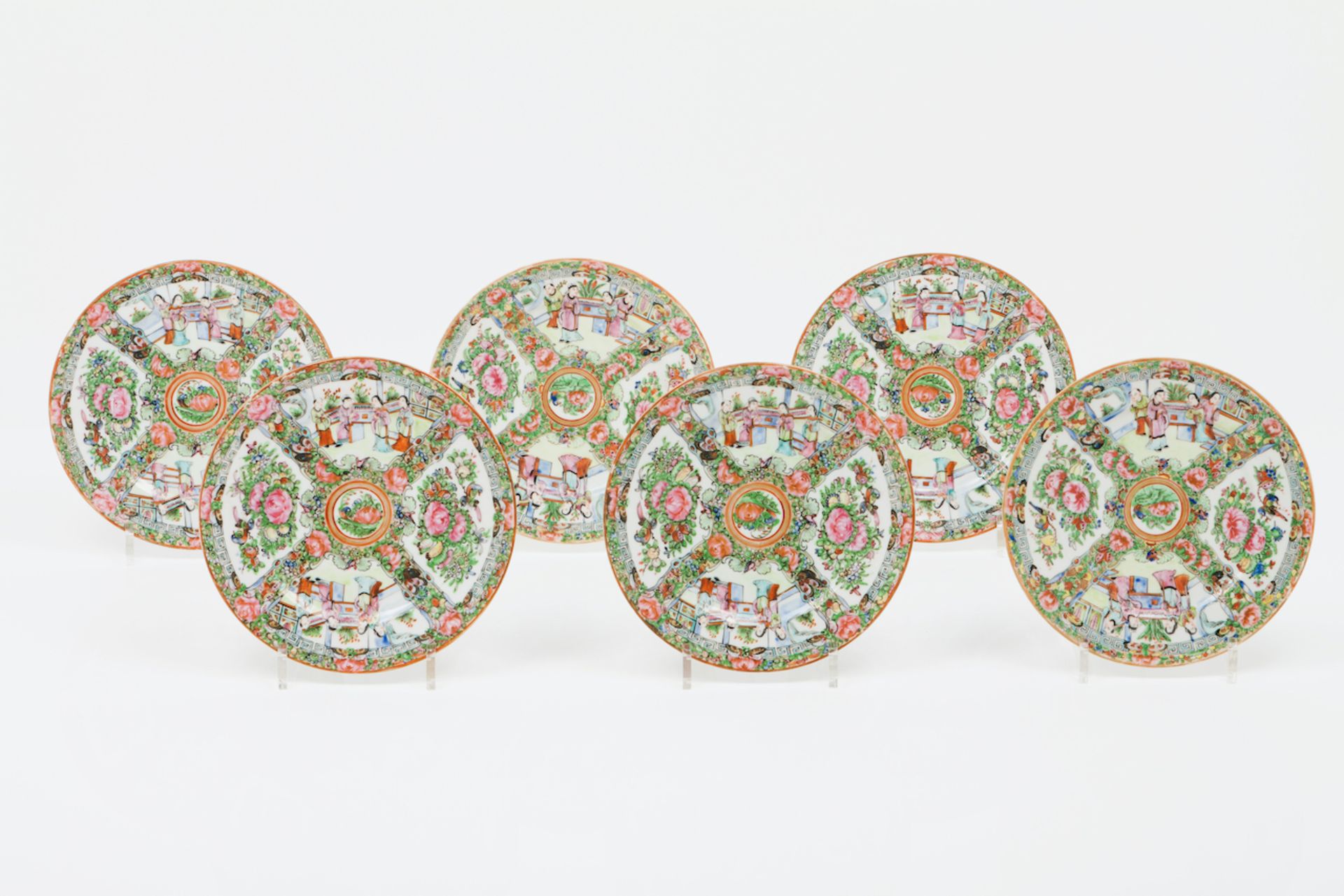 A six plate setChinese porcelainCanton decoration of flowers, oriental figures and birdsQing