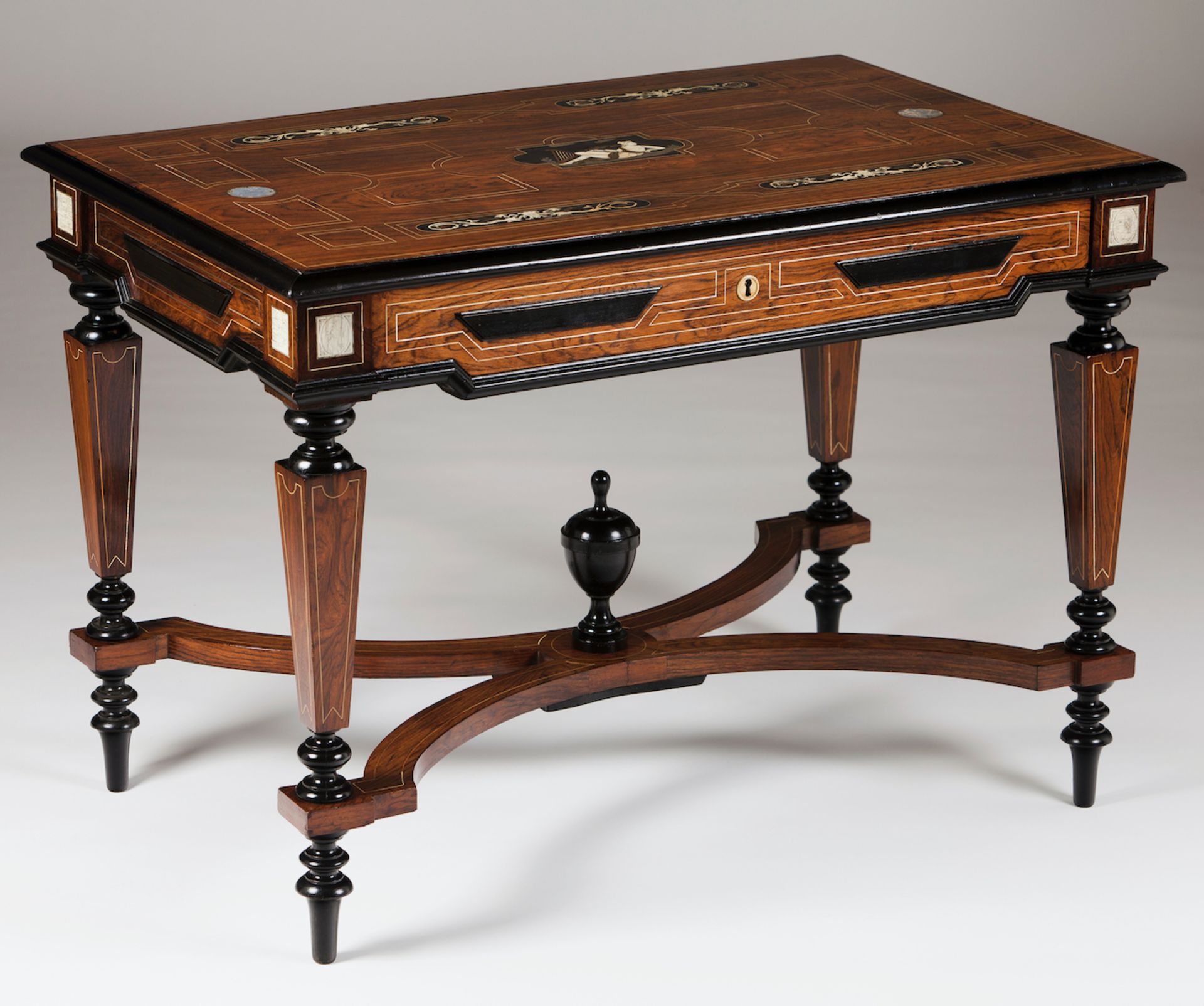 Charles X centre tableSolid and veneered mahoganyInlaid ivory and metal decoration depicting in