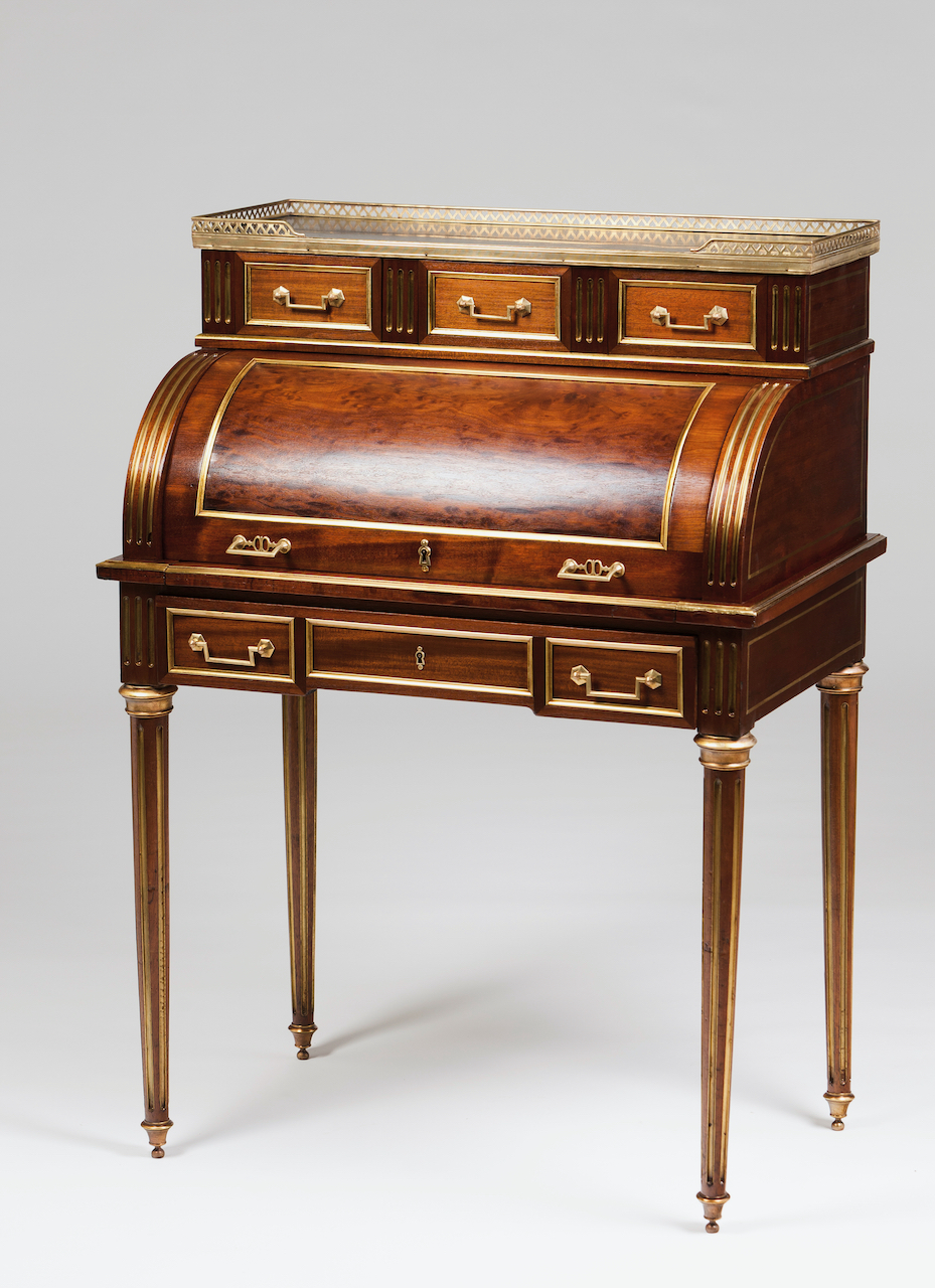 A small Louis XVI roll top deskSolid and veneered mahoganyGilt metal hardwareUpper section of marble