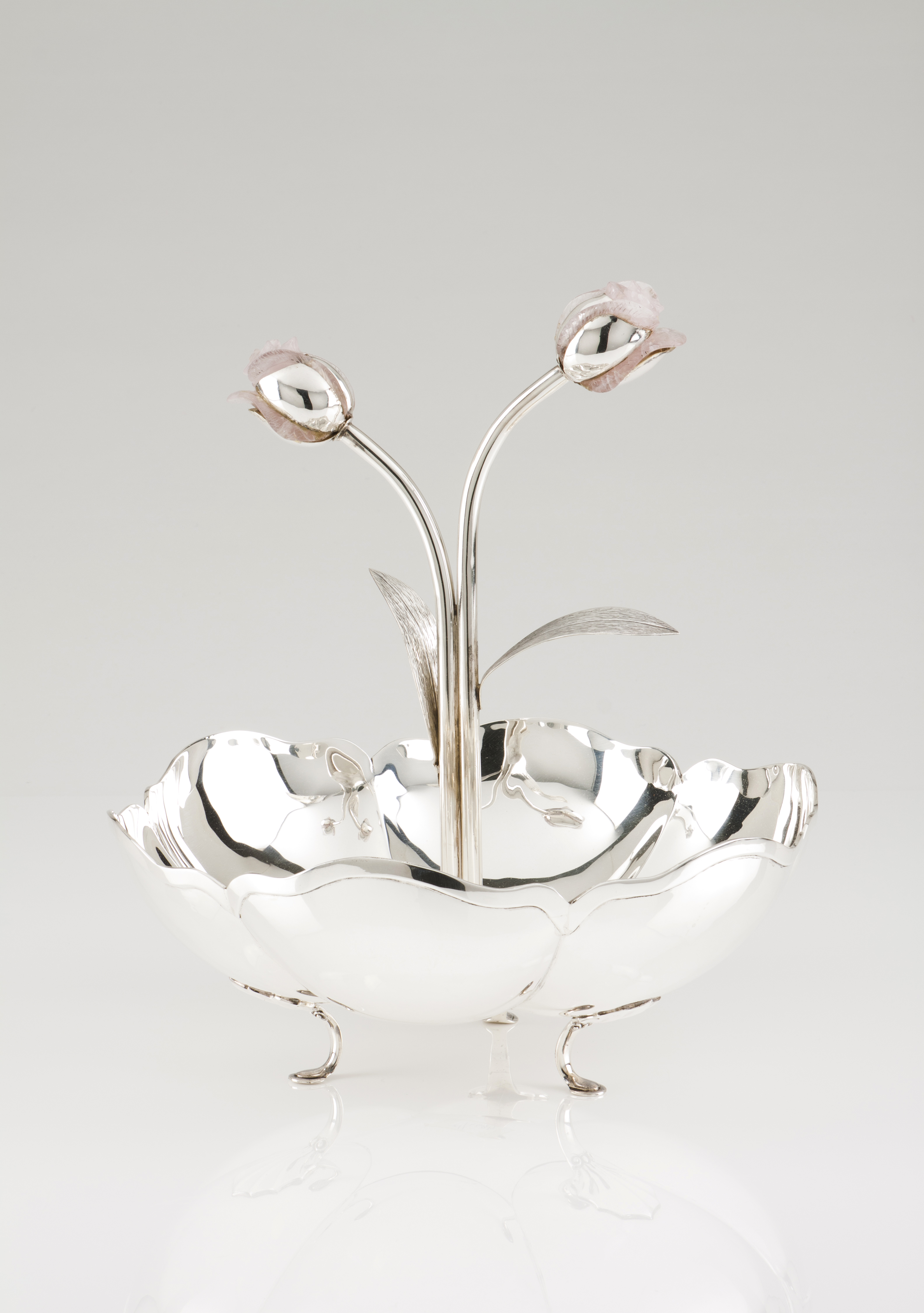 A fruit stand / centrepiecePortuguese silverSix petal flower shaped base with central tree trunk