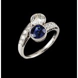 A "toi et moi" ringPlatinumSet with one brilliant cut diamond (ca.0.70ct) one oval cut sapphire (