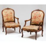 A pair of Louis XV style fauteuilsWalnutOf carved decorationTapestry upholsteryFrance, 19th century