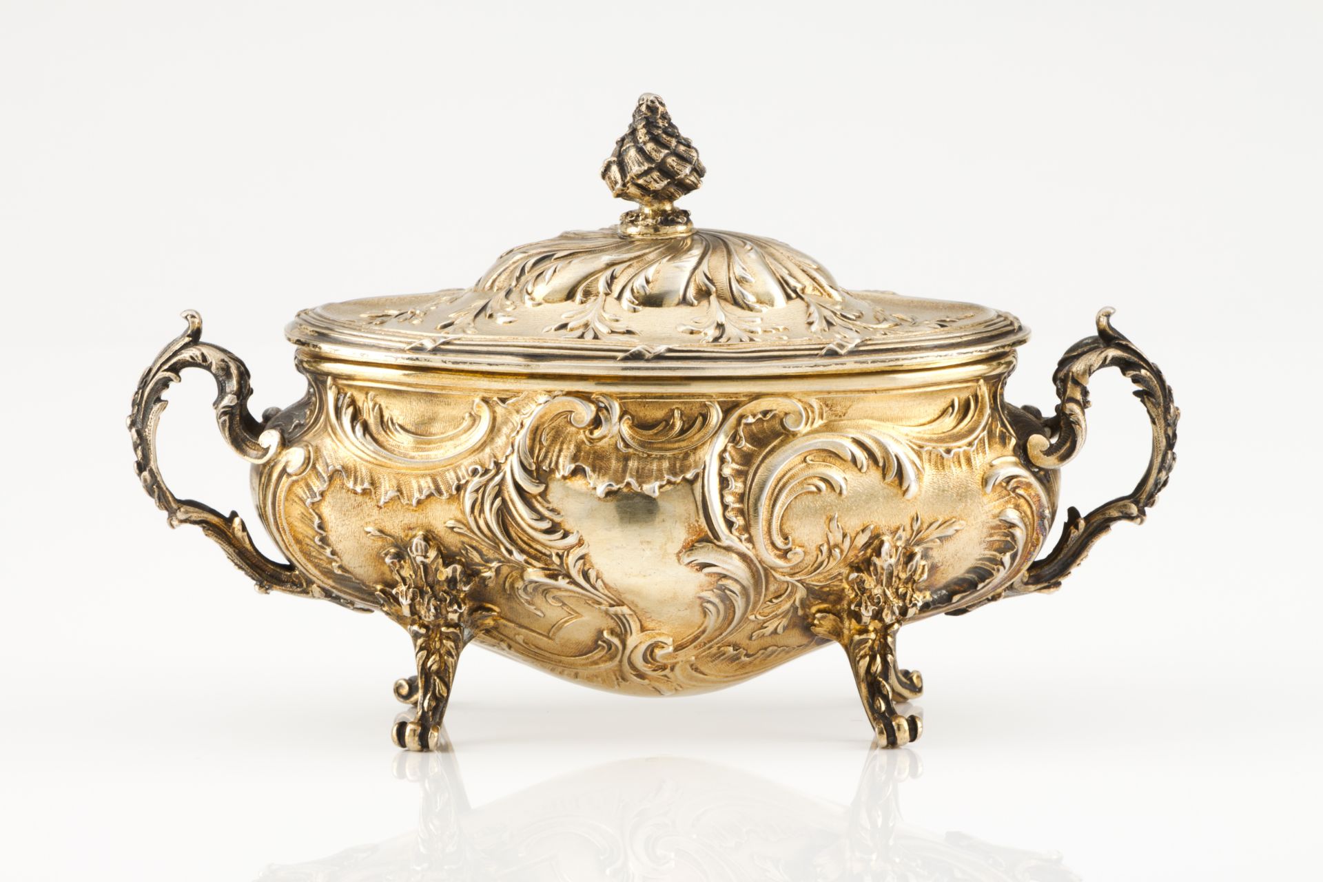 A small tureenFrench gilt silverProfuse raised decoration of foliage and flower motifs and pine cone