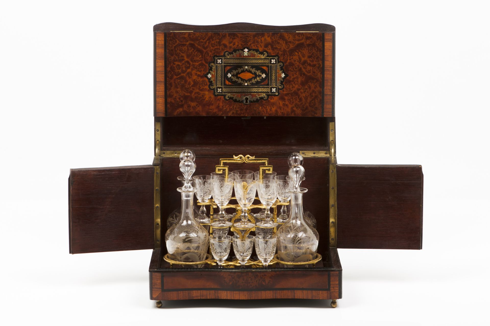 A Napoleon III liqueur caseWooden case veneered in burr mahogany with metal and mother-of-pearl