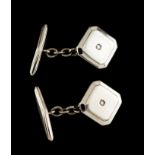 A pair of cufflinksPortuguese goldPlain square shaped of cut corners set with two 8/8 cut