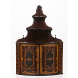 A corner hanging cupboardVarious timbers marquetry decoration with flowers and geometric