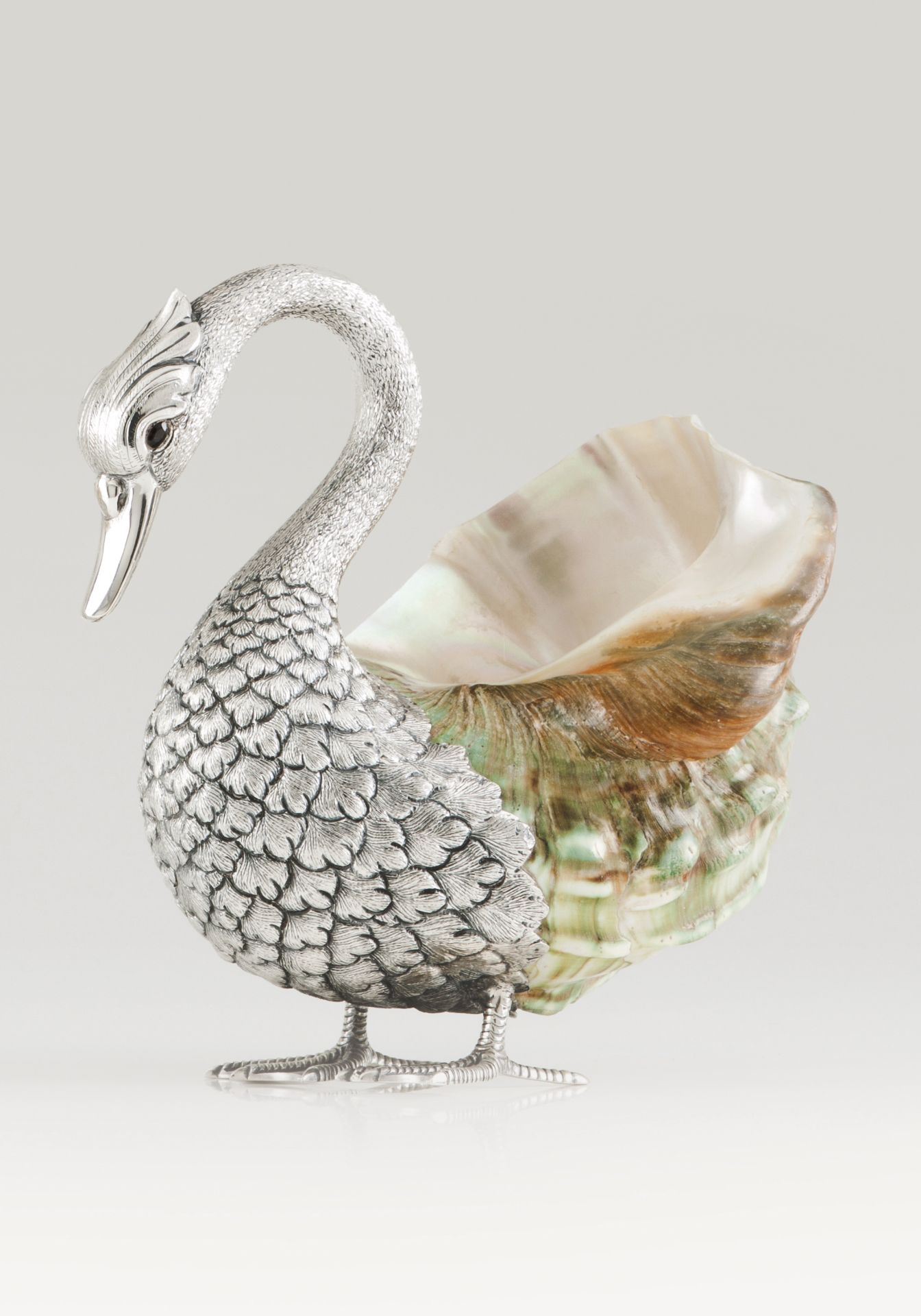 A pair of ducksA shell and portuguese silver sculpture representing a standing duckPorto assay