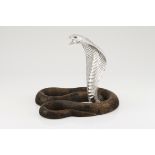 A snakeEngraved silver and carved woodDepiction of a cobra with garnet eyesOporto hallmark, Eagle