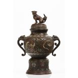 An incense burnerPatinated bronzeRaised geometric decoration of floral polychrome cloisonne