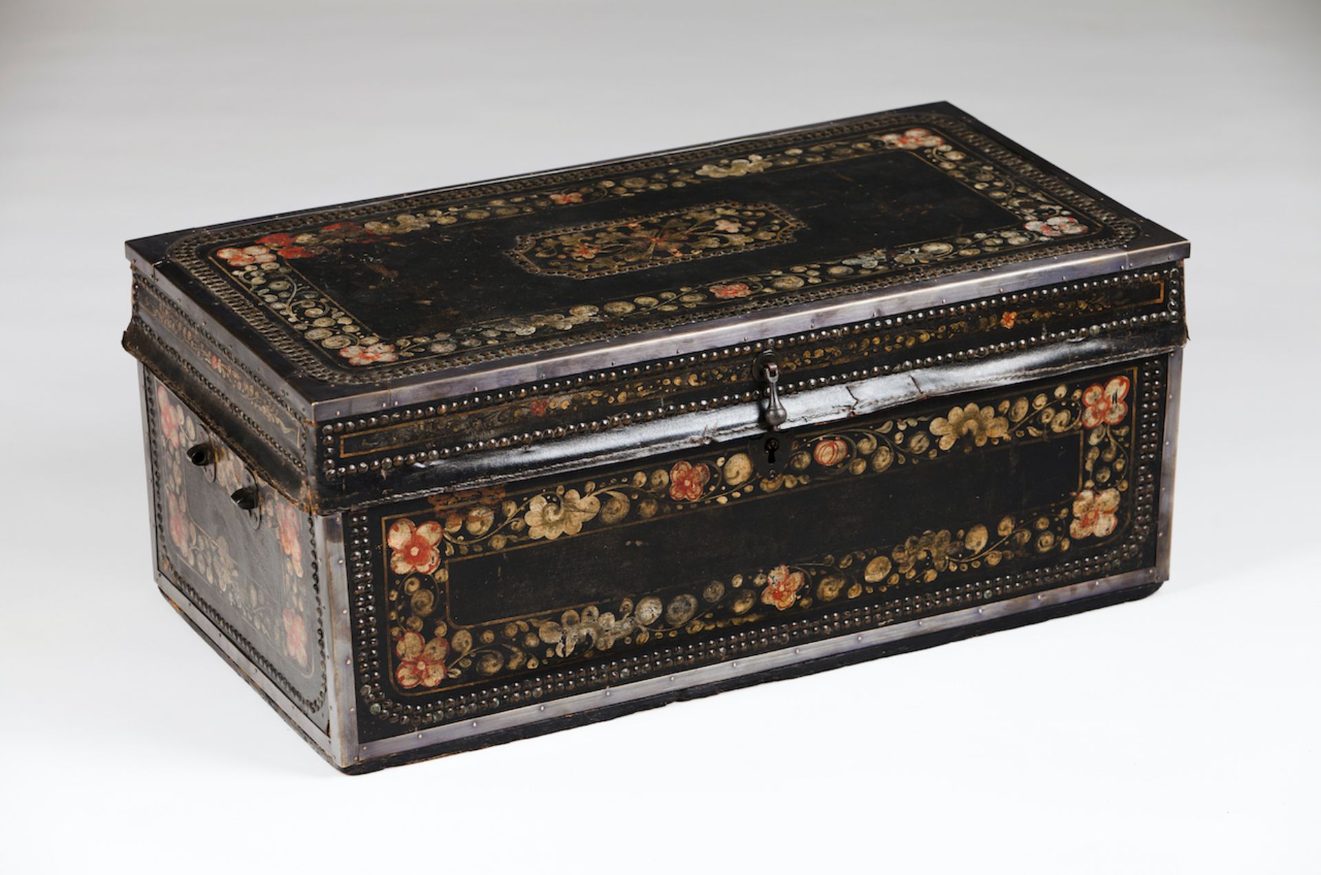 A chestCamphor wood and other materials fully coated in painted leather of polychrome floral